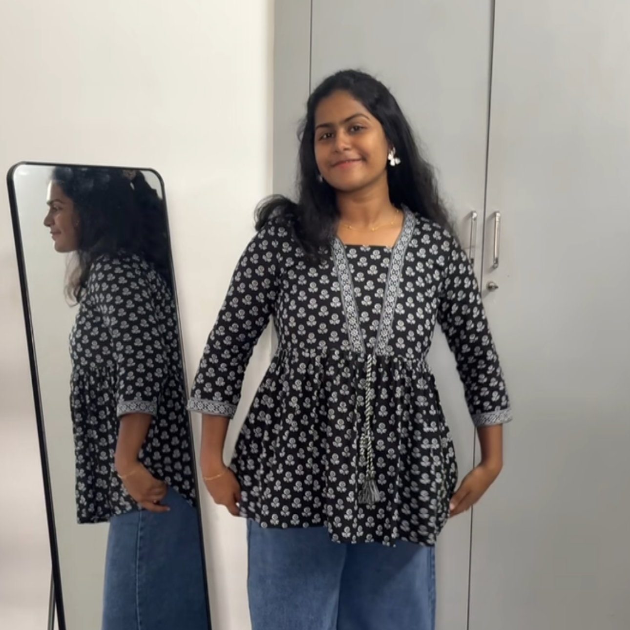 Black Front Peplum Top