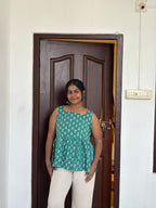 Green sleeveless Peplum Top