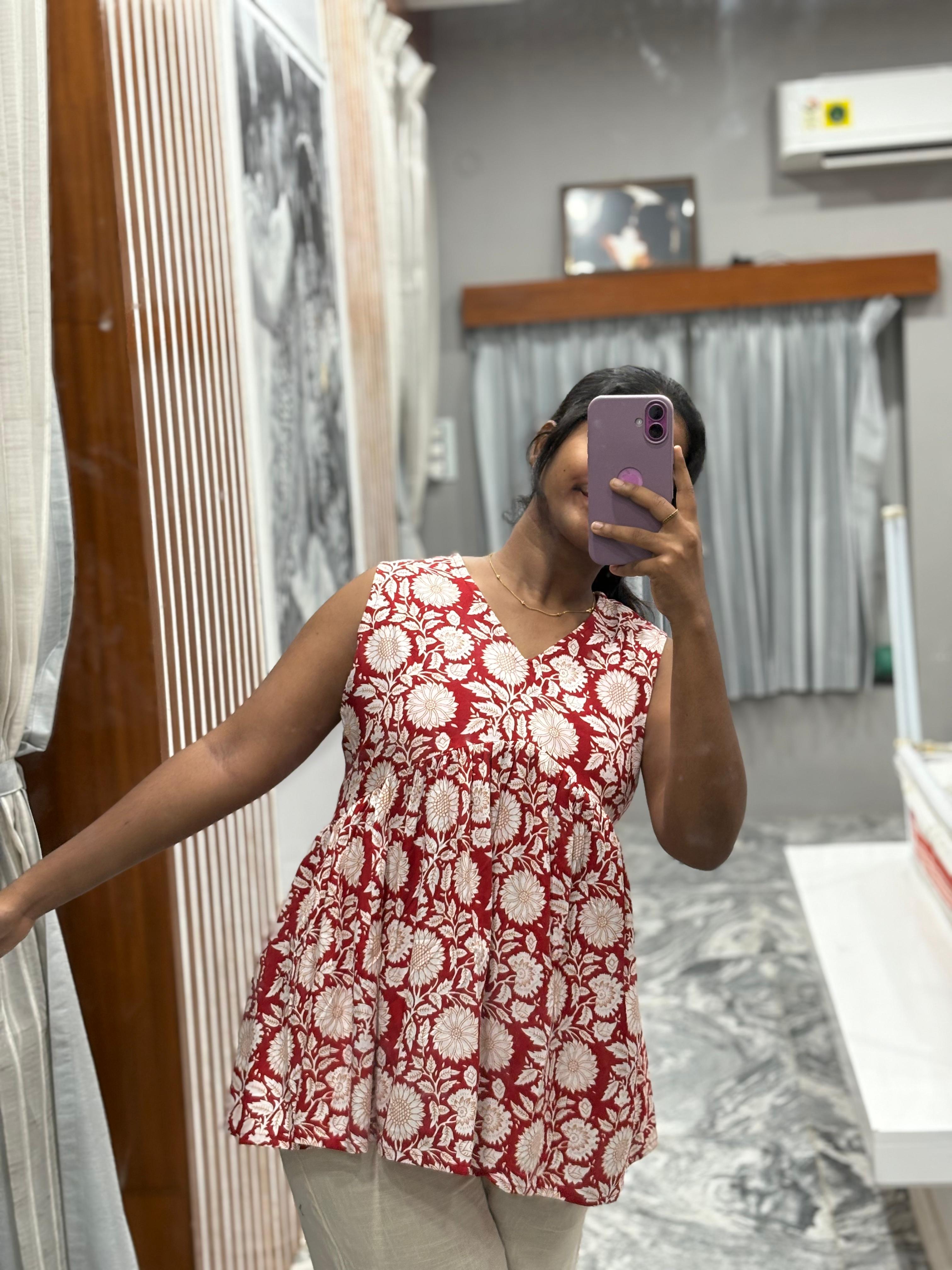 Red sleeveless Peplum Top